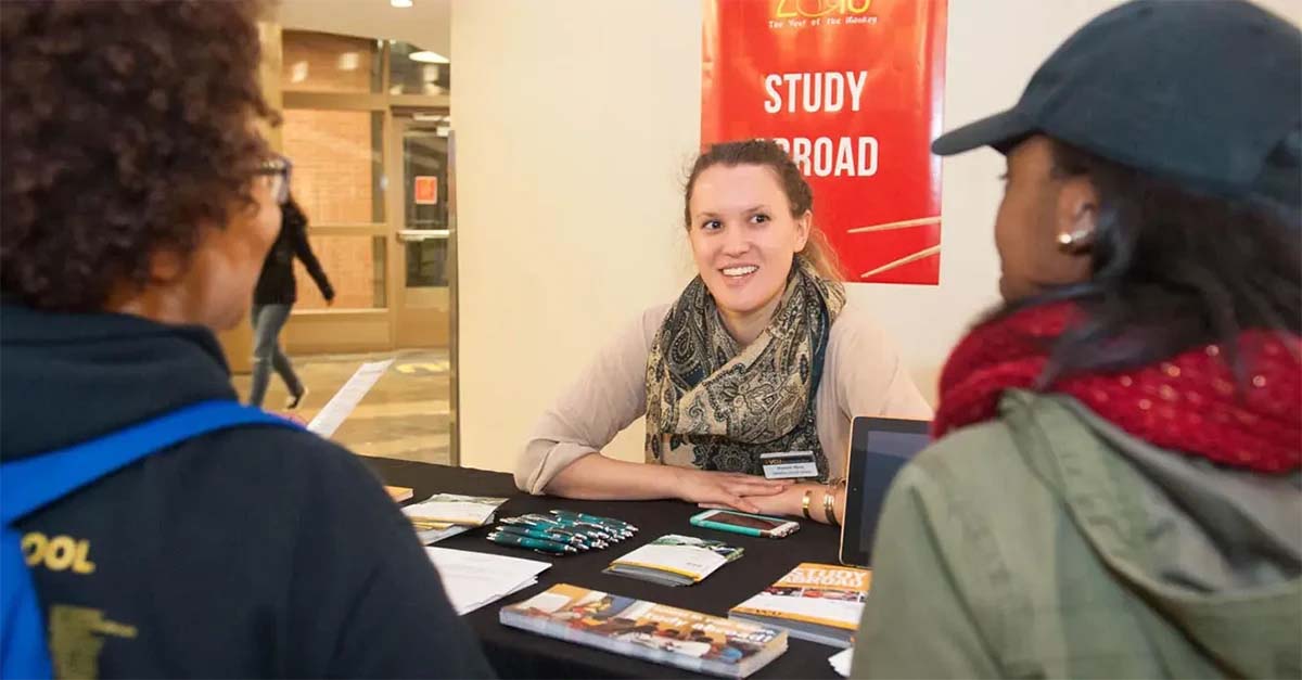 students having a meeting to learn about a study abroad program